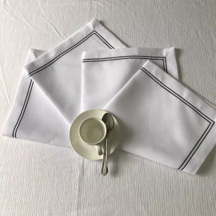 20X20 NAPKINS with a cup n saucer on it, htamerica